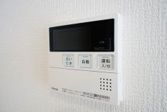 同仕様写真。キッチン横からボタンひとつで操作が楽々。