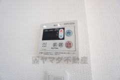 キッチン横からボタンひとつで操作が楽々。